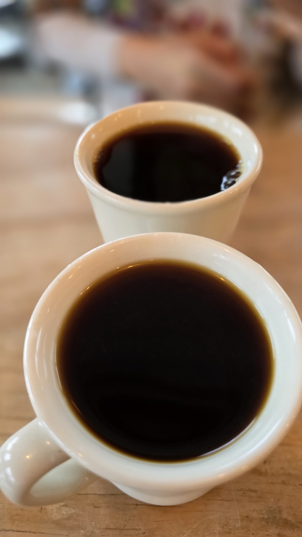Two coffees on a table